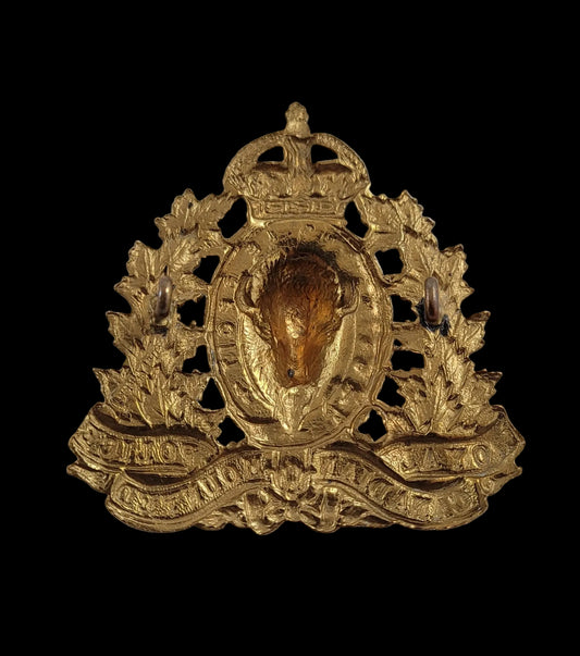 WW2-Era Cap Badge to the Royal Canadian Mounted Police Obverse