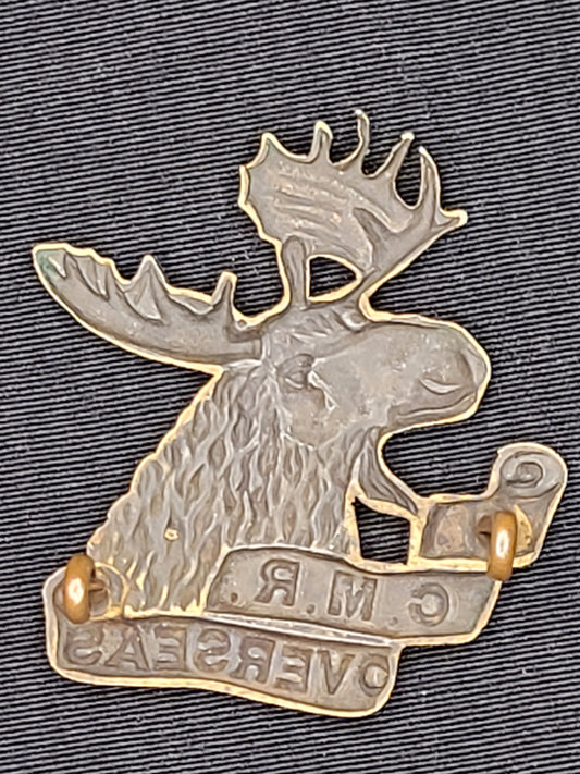 WW1 CEF 4th C.M.R. Cap Badge
