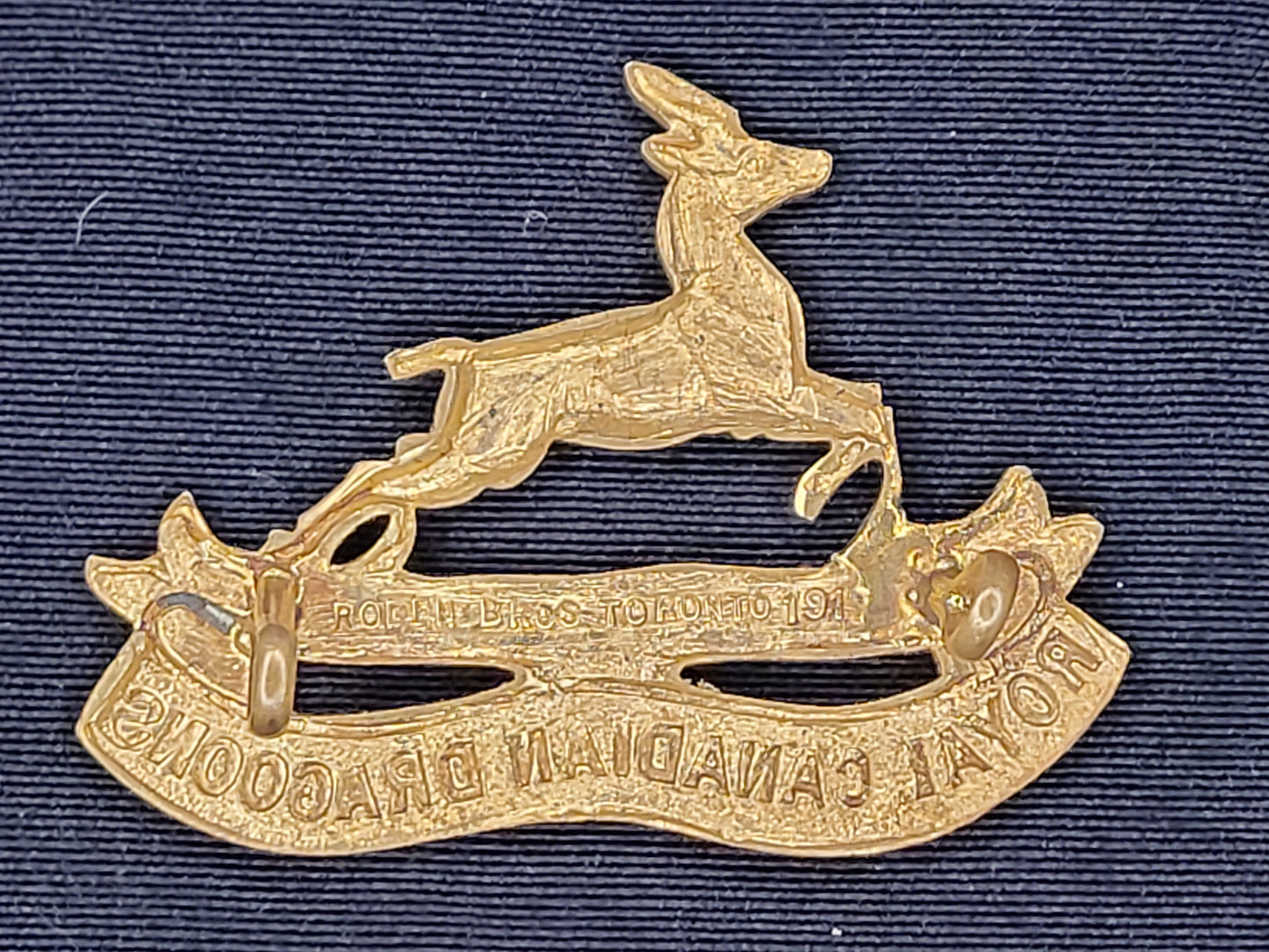 WW1 CEF Royal Canadian Dragoons Gilt (officer's?) 1917 dated Cap Badge