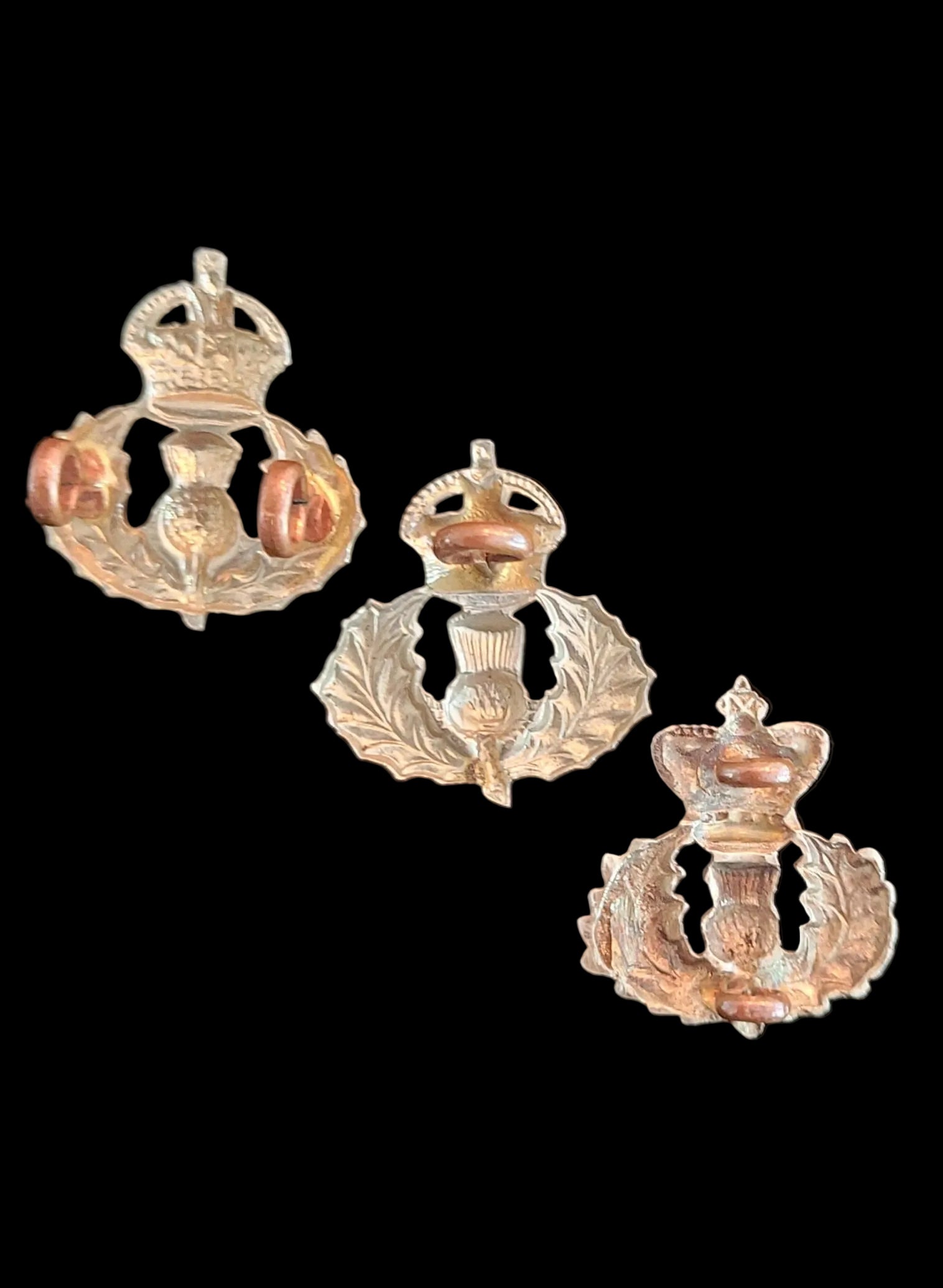 Collar_Badges_for_the_Queen_s_Own_Cameron_Highlanders_-_Spanning_Three_Eras