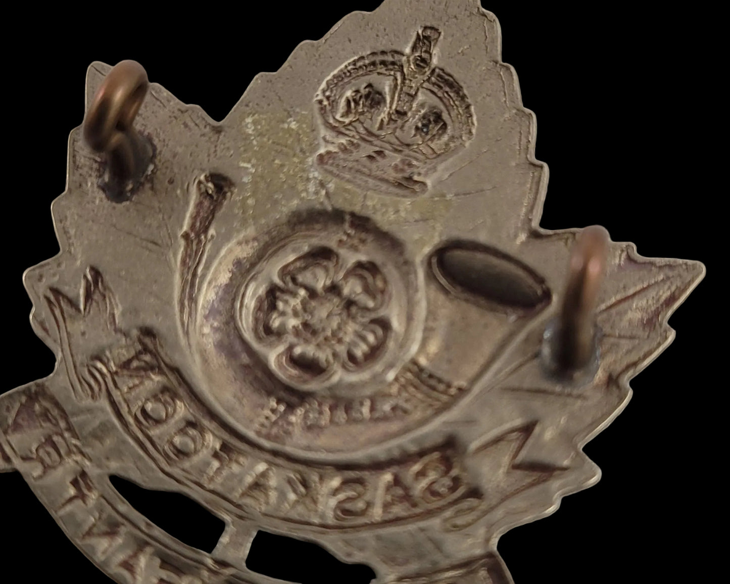 WW2 Cap Badge to the Saskatoon Light Infantry Maker Mark