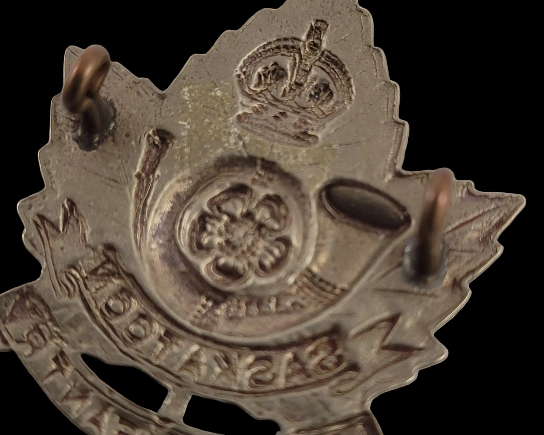 WW2 Cap Badge to the Saskatoon Light Infantry Maker Mark